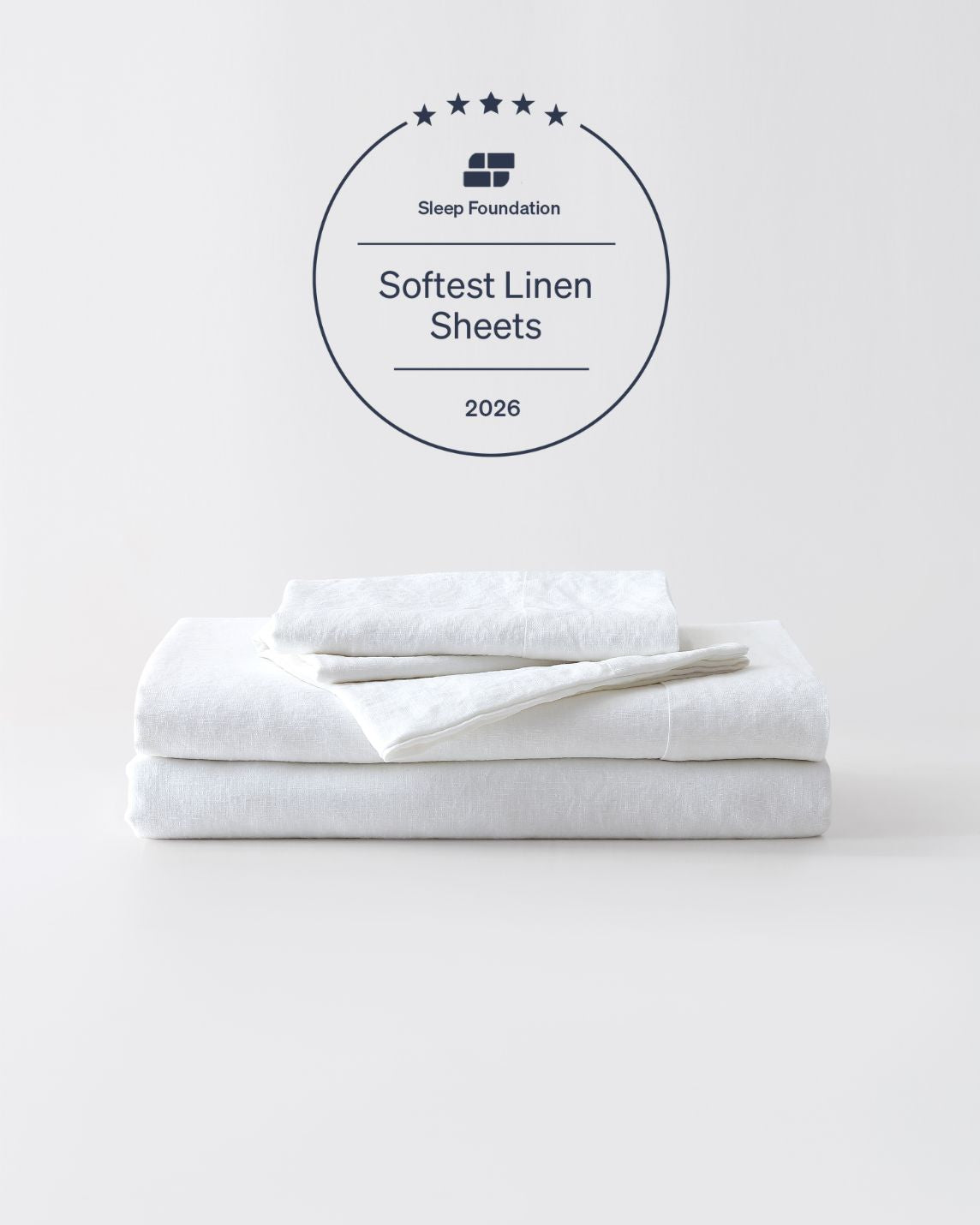 A stack of white linen sheets against a plain background. [39418737524920, 39418737557688, 39418737590456, 45933184057563,46509672988891]