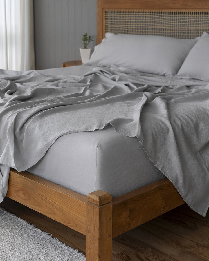 Baloo Living Stonewashed Linen Sheets Set! Classically elegant European linen sheets for hot and cool sleepers alike. Exceptionally durable, breathable, and luxuriously relaxed, our stonewashed natural fibers start soft and grow softer with time. An heirloom-quality investment that will last for decades to come. The set includes a fitted sheet, flat sheet, and two pillowcases. This comes in four different colors: Dove Grey, Oatmeal, White, and Charcoal!